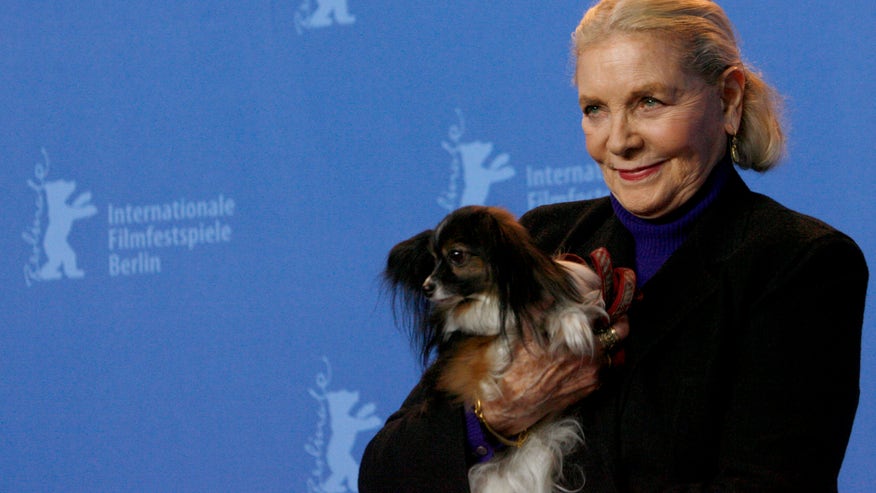 lauren bacall and dog reuters.jpg
